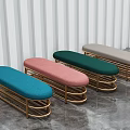 Colorful Sofa Stools With Gold Metal Frames And Striped Wall Background