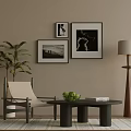 Elegant Leisure Chair in Beige Living Room with Black White Art Green Plant and Coffee Table