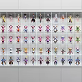Collection of Various Colored and Styled Dolls Arranged Neatly on White Shelves