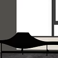Modern Black Chaise Lounge With Curved Design In Minimalist Interior Room With Window Blinds
