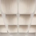 Elegant Continuous Pleated Ceiling Drapery Design With Soft White Fabric And Smooth Curves For Modern Interior Spaces