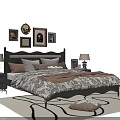 Double Bed with Dark Headboard Multiple Pillows Patterned Quilt Nightstands Table Lamps Wall Decor Rug