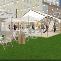 Vibrant Commercial Street with Tents String Lights and Green Grass at Free Camp