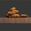 Fresh Potatoes Heap Displayed On Wooden Tray Close Up View