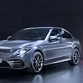 Silver Mercedes Benz Sedan In Modern Indoor Showroom With Sleek Design