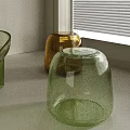 Modern Glass Stool With Green Yellow Vases On White Countertop By Window Blinds
