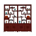Traditional Wooden Chinese Curio Cabinet With Multiple Shelves Holding Tea Sets Vases And Books