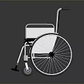 Modern Wheelchair With Gray Seat Metal Frame Large Wheels And Footrests
