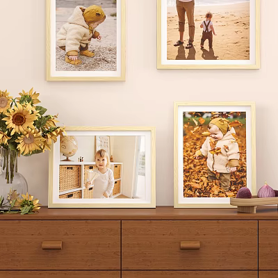 Decorative Photo Frames With Sunflower Bouquet And Children Photos On Wall And Table 3d model