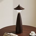 Modern Wooden Table Lamp With Tapered Base And Conical Shade On Round Table