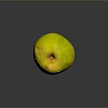 Fresh Yellow Green Apple with Brown Stem on Smooth Dark Surface