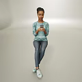 Woman Sitting Using Smartphone In Teal Sweater Blue Jeans White Sneakers On Plain Background