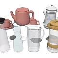 Household Daily Appliances Featuring Colorful Teapots Mugs And Transparent Pitchers