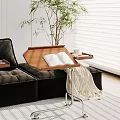 Wooden Side Table With Metal Stand By Black Sofa With Open Book Coffee Cup Tray