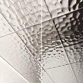 Textured Metallic Wall Decor With Geometric Patterns And Colorful Round Accents