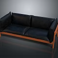 Black Leather Two Seater Sofa With Wooden Frame On Reflective Gray Floor
