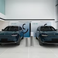 RIVIAN Car Showroom Displaying Two Blue Vehicles In Modern Spacious Interior