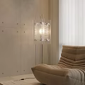 Modern Floor Lamp With Transparent Design In Living Room With Beige Wall And Brown Sofa