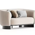 Modern Beige Sectional Sofa with Gray and Brown Patterned Pillows and Black Metal Legs