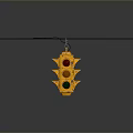 Worn Yellow Traffic Light Hanging From Wire With Three Lights On Gray Background