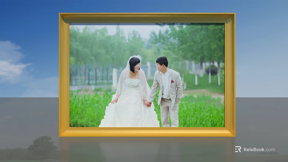 Golden Photo Frame Displaying Newlyweds In Outdoor Grassy Field With Green Trees And Blue Sky 3d model 