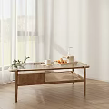 Wooden Coffee Table With Rattan Detail In Bright Room With Natural Light And Decorative Items