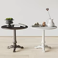 Dark and White Side Tables with Carved Bases and Decorative Green Bowl White Pitcher