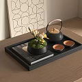 Elegant Tea Set with Teapot Teacups on Black Tray Wooden Table and Small Plant
