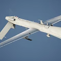 White Unmanned Fighter Drone Flying High In Sky With Long Wings And Payload