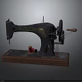 Vintage Sewing Machine with Retro Design Wooden Base Golden Decoration and Red Thread Spool