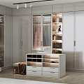 Modern Walk in Closet with Gray Cabinets Glass Doors Drawers and Built in Lighting