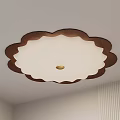 Flower Shaped Ceiling Light With White Shade Brown Edge And Gold Center 3d model