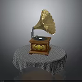 Vintage Gramophone with Golden Horn and Decorative Wooden Base on Round Table with Patterned Tablecloth