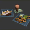 Cat Shaped Rice With Strawberries Pink Ice Cream Cone And Onion Rings On Blue Plates