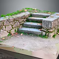 Natural Stone Steps And Walls Decorated With Moss And Scattered Fallen Leaves