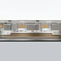 Modern Minimalist Public Toilet Wash Area With Large Backlit Mirror Marble Countertop And Wooden Cabinets