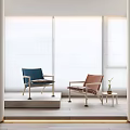 Modern Leisure Chairs With Blue Brown Upholstery By Window With Natural Light And Side Table