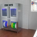 Cafeteria Stainless Steel Sterilizer With Blue Lighting And Colorful Plates On Tile Walls And Floor