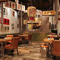 Traditional Hotpot Restaurant with Red Lanterns Chinese Signs Wooden Tables and Leather Seats