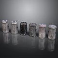 Six Cylindrical Trash Cans With Different Textured Surfaces Arranged On Black Background