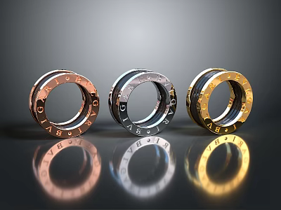 Three Colored Metallic Rings With Decorative Letters As Household Accessories 3d model