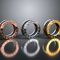 Three Colored Metallic Rings With Decorative Letters As Household Accessories