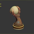 Hand Sculpture With Bronze Texture Holding Light Colored Egg On Brown Base