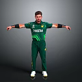 A Man in Green Pakistan Cricket Uniform with Arms Outstretched Standing