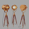 Vintage Brass Floor Lamps With Tripod Bases And Classic Design