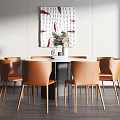 Modern Round Dining Table Set With Orange Chairs And Decorative Wall Art 3d model