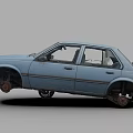 Old Blue Sedan Car With Missing Wheels And Worn Body Condition