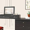 Elegant Black Dressing Table with Red Stool Framed Art Potted Plant and Mirror