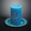Blue Candle Lamp with Decorative Blue Plate and Wick on Dark Background