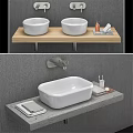 White Round And Rectangular Washbasins On Wooden And Grey Countertops With Toiletries